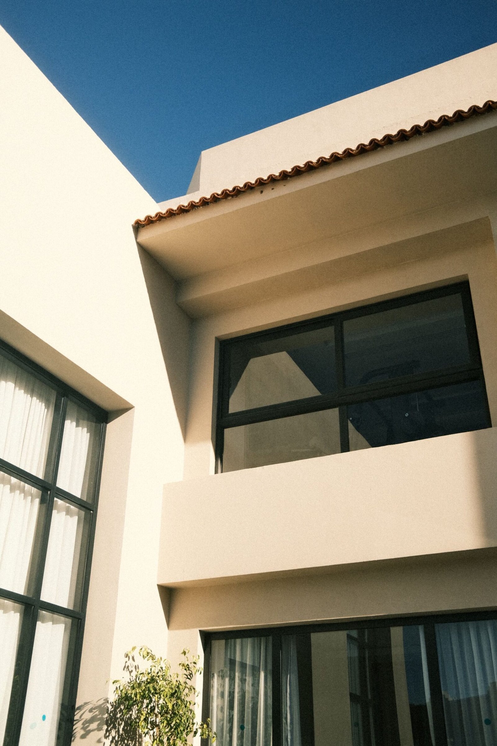 Elegant large modern house with finished exterior walls - illustrative stock photo