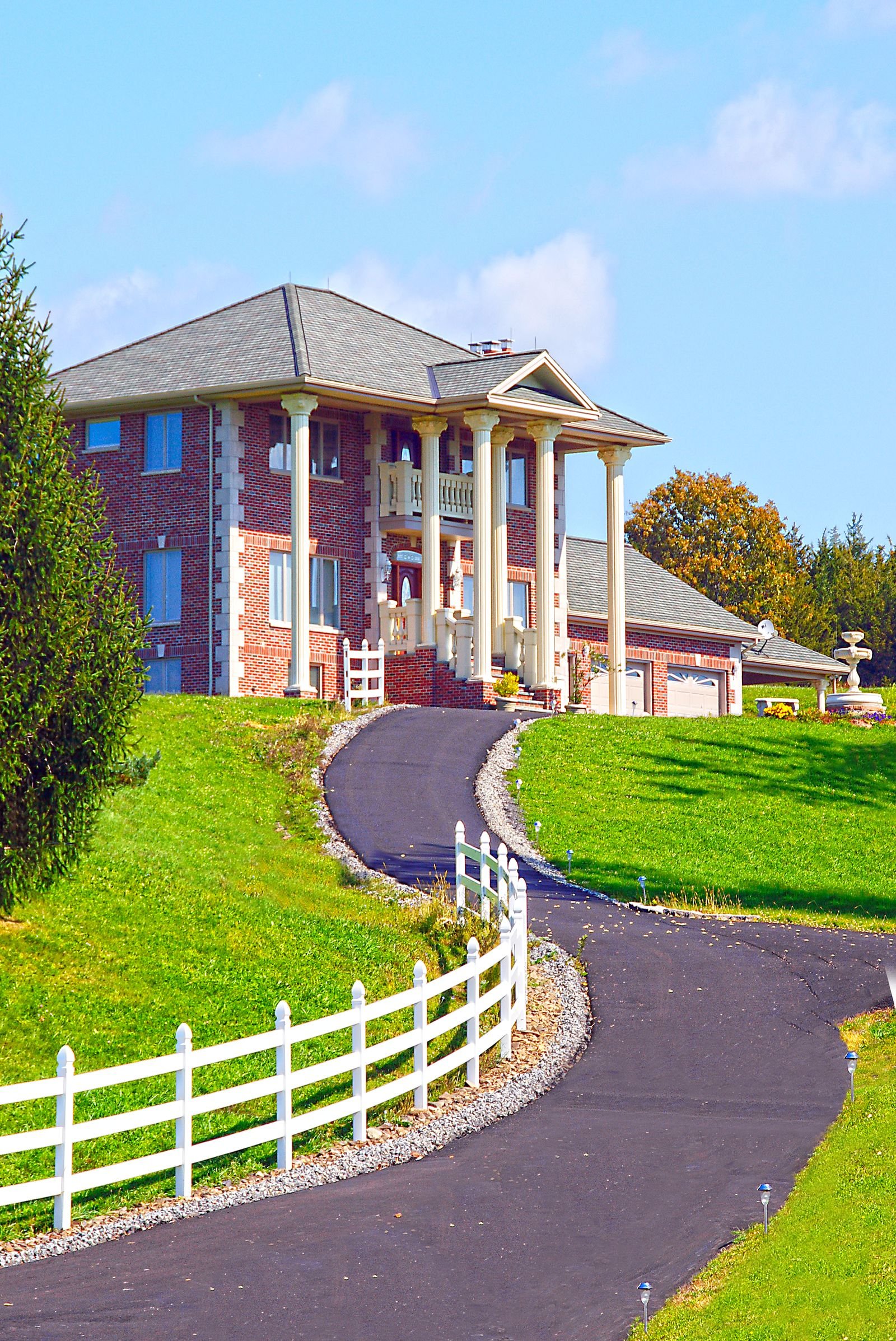 Luxury house exterior with columns and architectural details - illustrative stock photo